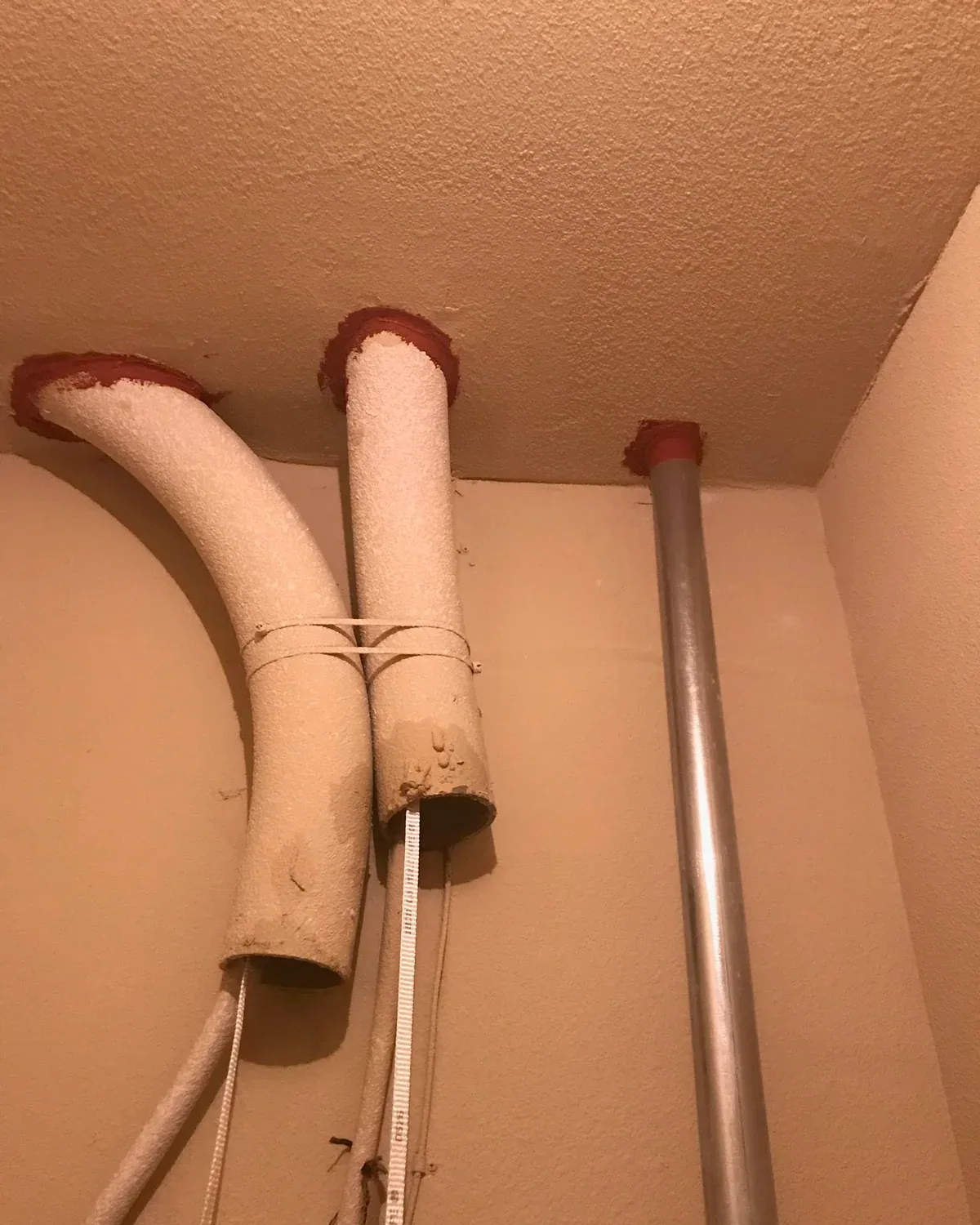 2Brothers Wireless exterior conduit run along a commercial building
